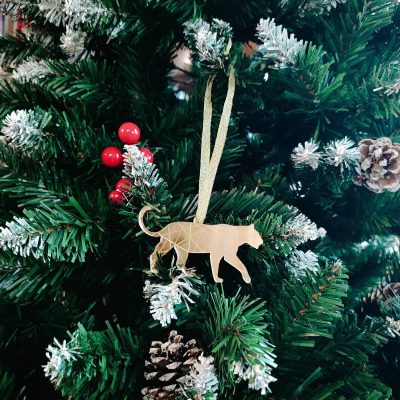 Christmas tree toy “Silhouette of a walking snow leopard”
